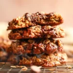 Gooey center of best oatmeal chocolate chip cookies with coffee